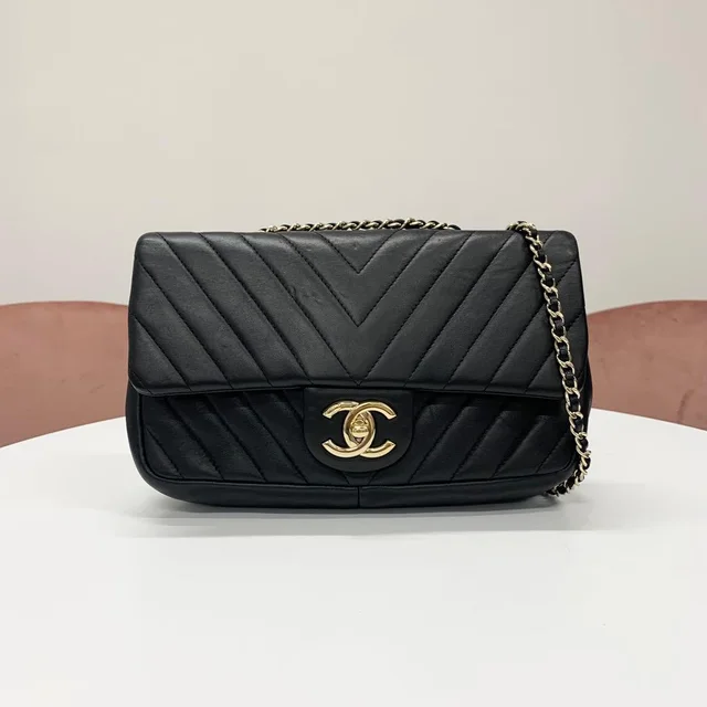 Chanel Chevron CC Logo Stitch Turnlock Shoulder Bag in Lambskin from The Reluxe
