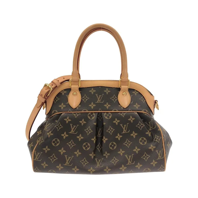 Louis Vuitton Monogram Trevi PM Bag in Coated canvas from The Reluxe