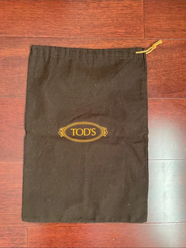 Tod's Brown Dust Bag With Yellow Logo in gold|brown|red from Poshmark