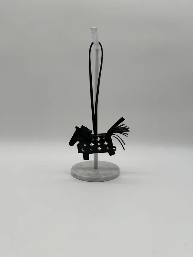 Hermès Rodeo Robeo Rock charm PM Milo/Lizard Noir in Black Lizard from Luxury Promise