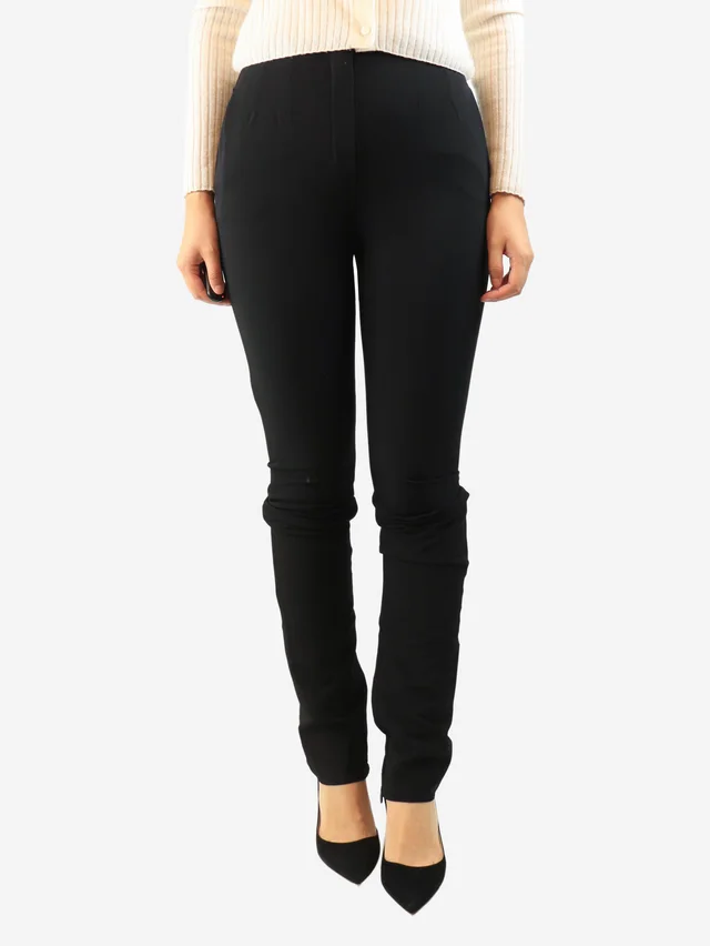 The Row Black high-waisted tapered trousers - size UK 12 in Black Wool from Sign of the Times