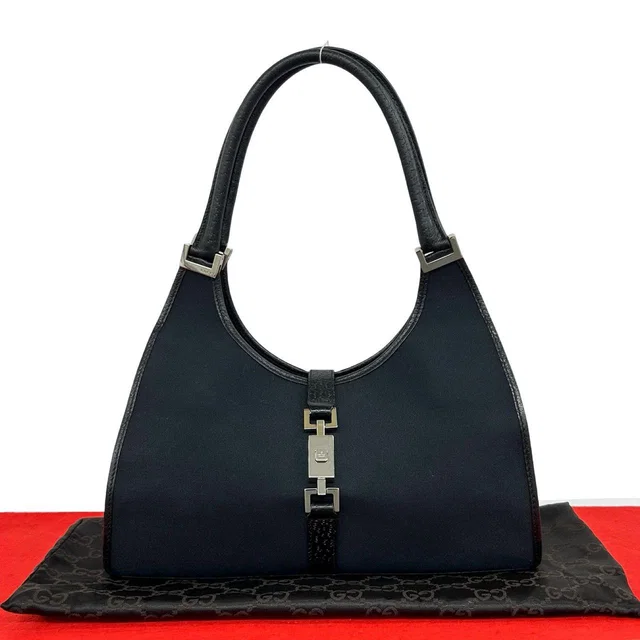 Gucci Jackie Canvas Leather Tote Shoulder Bag Handbag Black in Black Canvas from The Reluxe