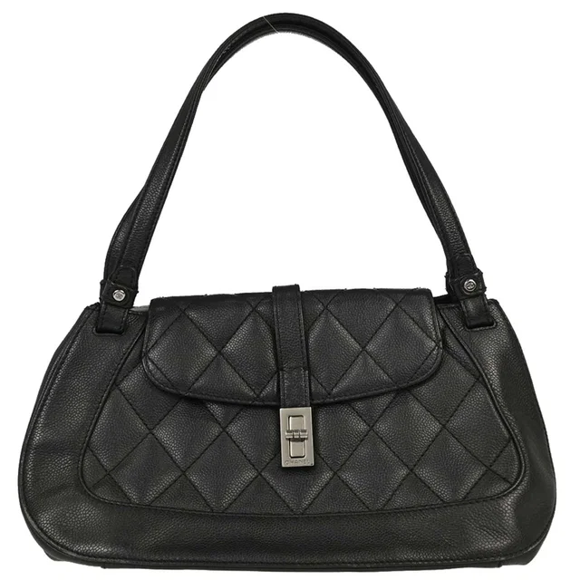 Chanel 2005-2006 Black Caviar Skin Mademoiselle Lock Handbag in Black Caviar leather from AMORE Vintage Tokyo