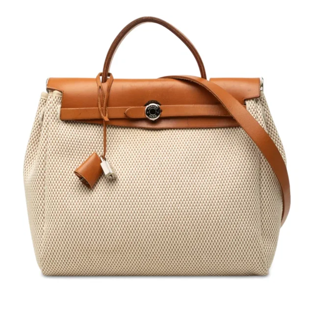 Beige Hermès Toile Herbag PM Satchel in Beige Canvas from Designer Revival