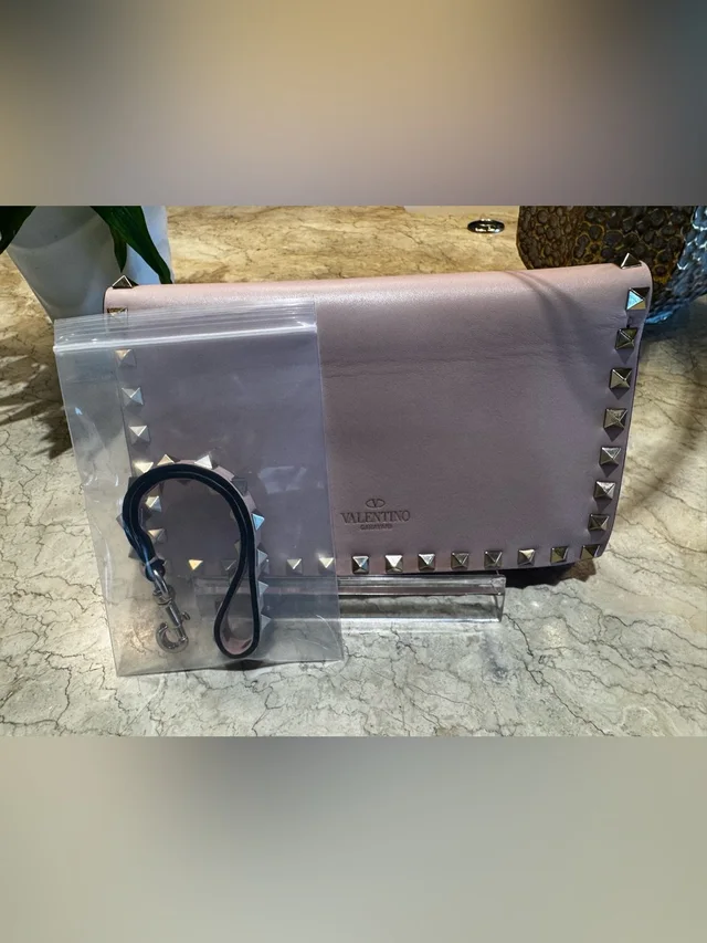 Valentino Garavani Dusty Pink Rockstud Clutch/Wristlet in pink Leather from Poshmark