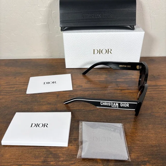 Dior Women's Oversized Sunglasses - Brown/Black in brown|red|black from Depop, photo 1 of 1