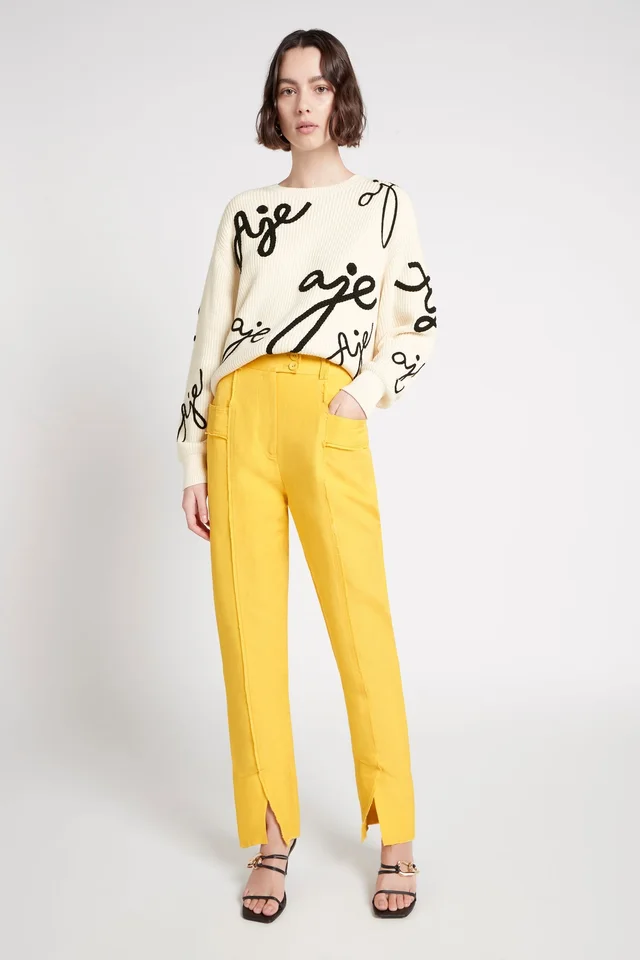 AJE Martino Tapered Leg Pant in Yellow from Aje, photo 1 of 1