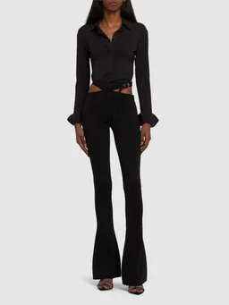 The Attico Flare pants with belt in 68% Viscose, 27% Polyamide, 5% Elastane, photo 2 of 5 from LUISAVIAROMA