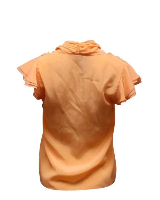 Alice & Olivia Jeannie Neck Tie Blouse in Orange Silk in Orange, photo 3 of 4 from ShopSimon