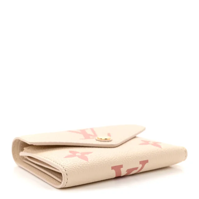 Louis Vuitton Empreinte Monogram Giant Victorine Wallet Creme Bois De Rose in Pink Calfskin from FASHIONPHILE, photo 4 of 8