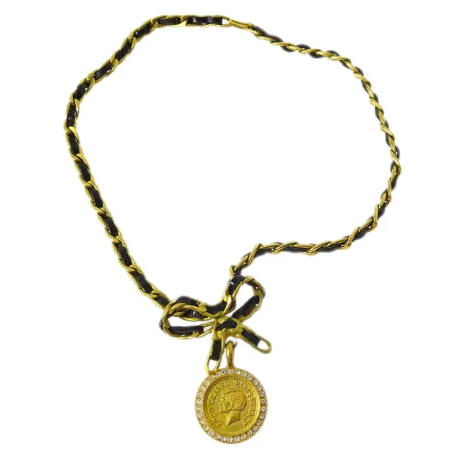 Chanel Gold Black Bow Medallion Rhinestone Pendant Necklace 95P in Black Leather from AMORE Vintage Tokyo