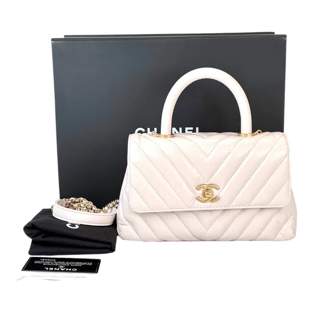 Chanel Cream Chevron Top Handle with GHW in Calfkin in White from Luxury Promise