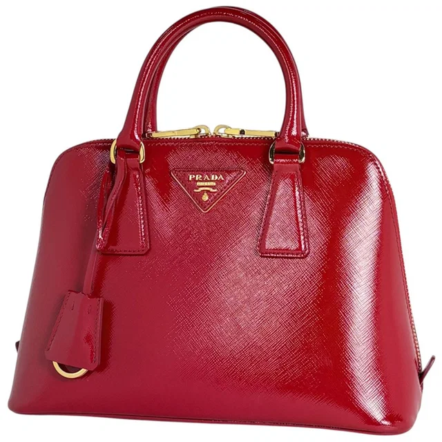 Prada Handbag Patent Saffiano Leather Rosso in Saffiano leather from The Reluxe