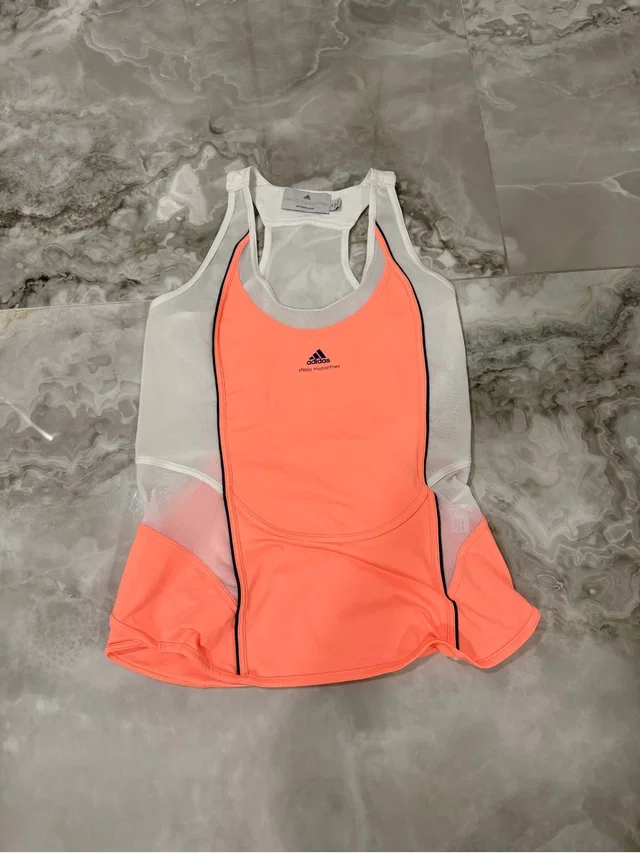 Stella McCartney And Adidas Women’s Neon Coral And White Tank in white|pink from Poshmark