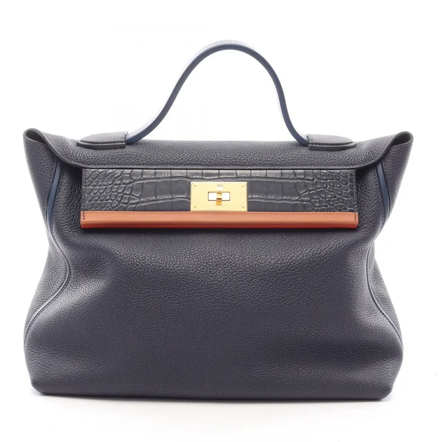 Hermès Handbag 24/ / Vanquatre 35 Touch Bleu Nuit in Navy Togo leather from The Reluxe