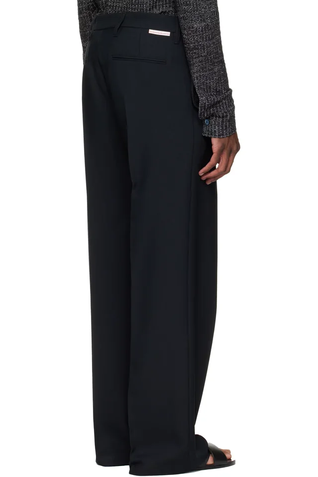 Stockholm (Surfboard) Club Black Tailored Bootcut Trousers, photo 3 of 4 from SSENSE