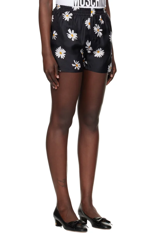 Moschino Black All Over Daisy Print Shorts, photo 2 of 4 from SSENSE