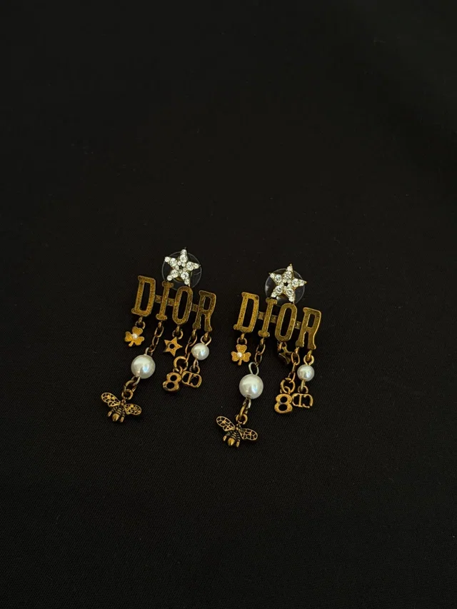 Dior Gold Crystal Star Letter Charm Earrings in Gold from Luxury Promise