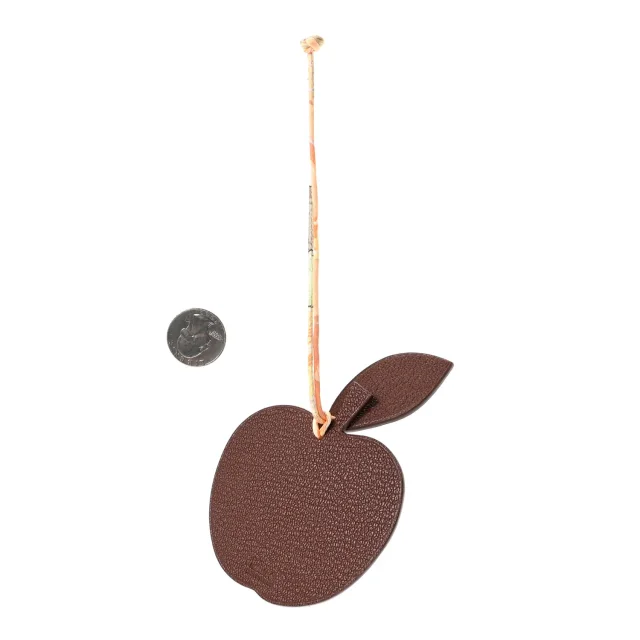 Hermès Taurillon Clemence Chevre Mysore Silk Petit H Apple Leaf Bag Charm in Clemence leather from FASHIONPHILE, photo 2 of 4