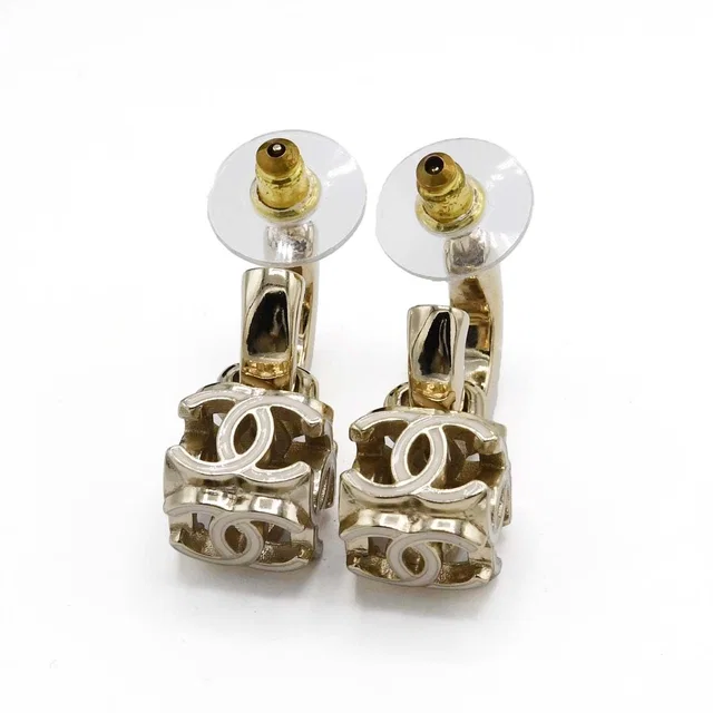 Chanel Earrings CC Logo Hoop Dice Champagne Gold in Gold from The Reluxe