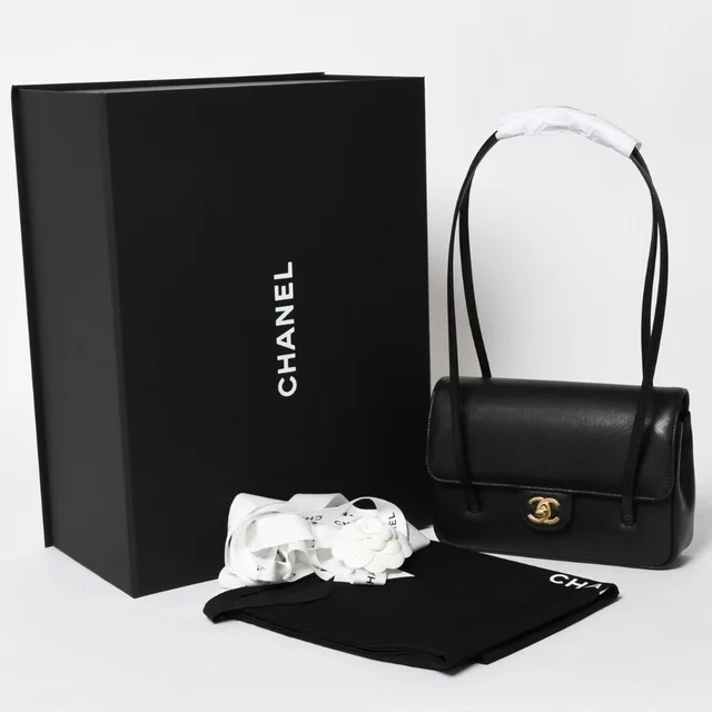 Chanel Small Flap Bag Stand CC Logo Caviar Leather Black in Black Caviar leather from The Reluxe