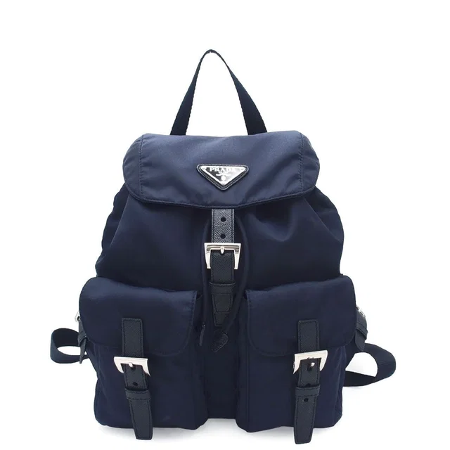 Prada Small Re-Nylon Backpack Blue Nylon in Blue Nylon from The Reluxe