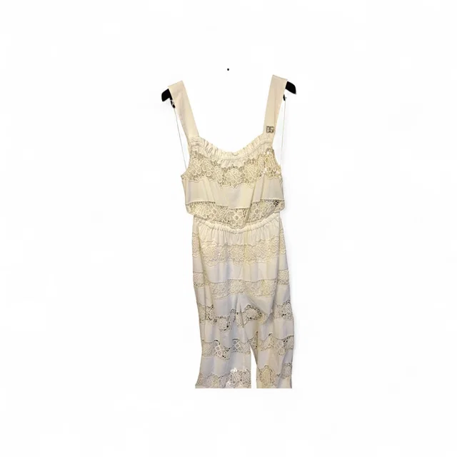 Dolce & Gabbana White Lace Strappy Jumsuit With DG Logo Silver Brooch in White from Luxury Promise