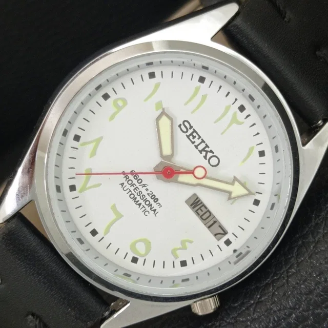 Vintage 1983 Seiko Automatic Mens Silver Watch W/Daydate & Gold Accents in gold|silver|gray from Poshmark