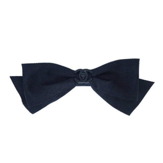 Chanel Turnlock Bow Satin Hair Barrette Black in Black Satin from AMORE Vintage Tokyo