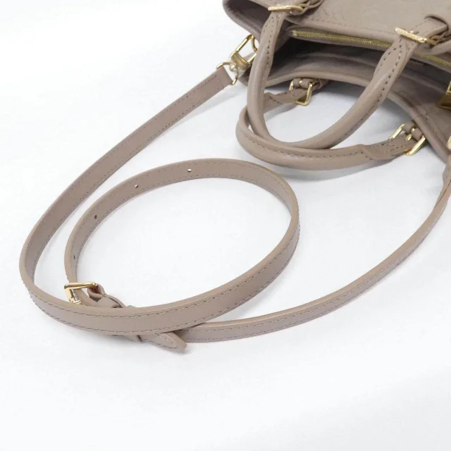 Louis Vuitton Monogram Empreinte Tote Bag in Beige Calfskin from LuxUness, photo 3 of 5