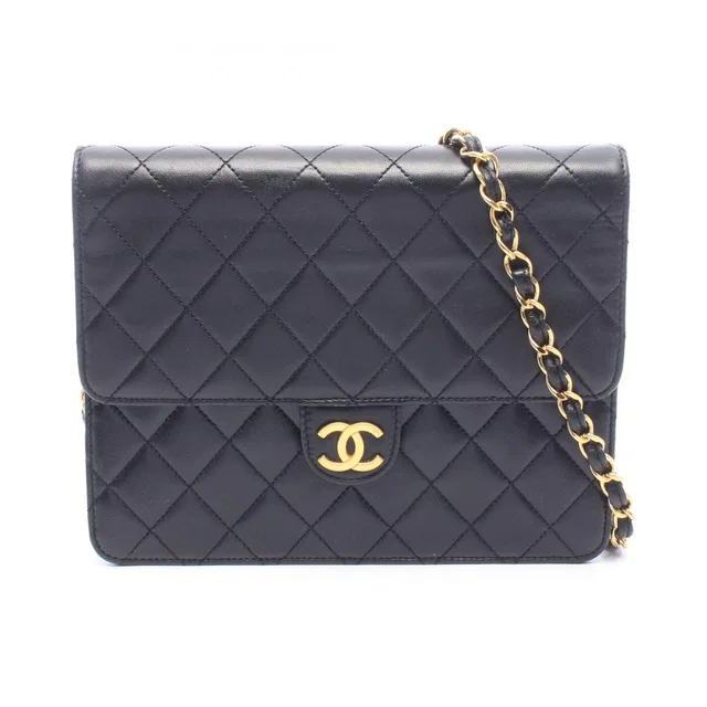 Chanel Shoulder Bag Quilted Single Flap Black Lambskin Push Lock Chain in Black Lambskin from The Reluxe