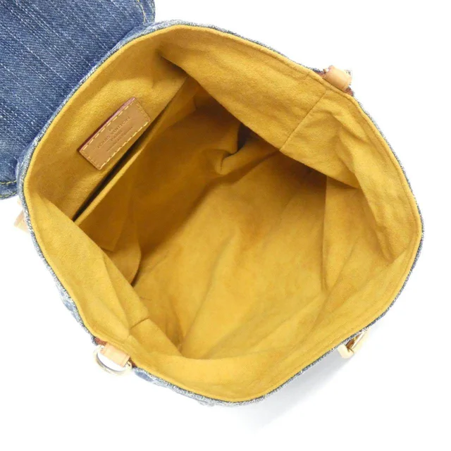 Louis Vuitton Monogram Denim Backpack in Blue Denim from LuxUness, photo 7 of 9