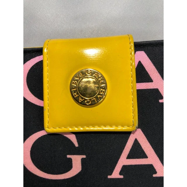 Bvlgari Women's Wallets - Black/Yellow in yellow|black from Depop, photo 3 of 9