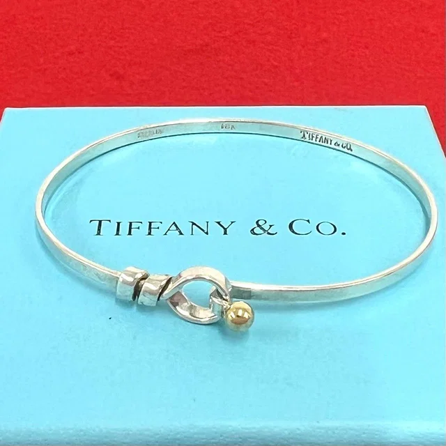 Tiffany & Co. Vintage Hook Eye Bangle Silver Gold Bracelet in Gold from The Reluxe