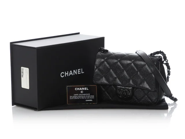 Chanel Mini Black Quilted Shiny Caviar Incognito Flap in Black Caviar leather from Ann's Fabulous Finds, photo 2 of 10