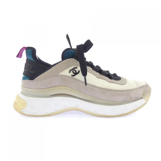 Chanel Sneakers Black in Black Calfskin from The Reluxe