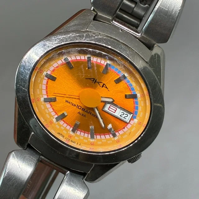 Seiko Vintage Alba Aka V743-5a10 Men's Quartz Watch Orange Dial 10bar in orange from Poshmark