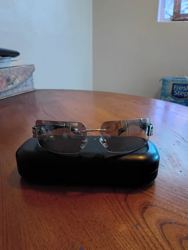 Versace Vintage Sunglasses in silver|gray|brown|red from Poshmark, photo 1 of 1