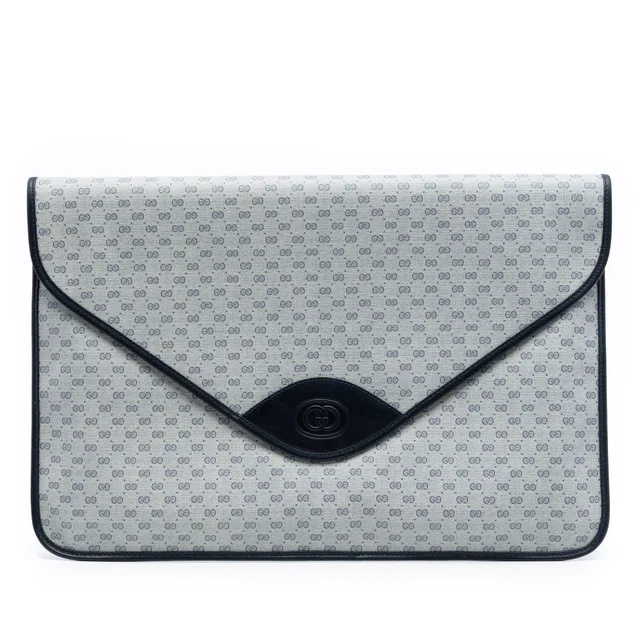 Gray Gucci Micro GG Supreme Clutch in Grey Coated canvas from Designer Revival