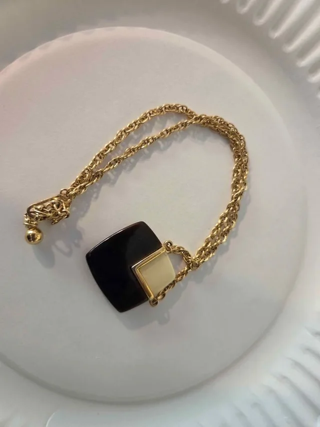Givenchy Vintage Geometric Pendant Necklace in black|gold|red Resin from Poshmark, photo 1 of 1