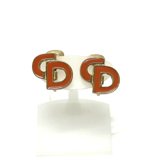Dior Earrings CD Logo Metal Gold Salmon Pink in Pink from The Reluxe