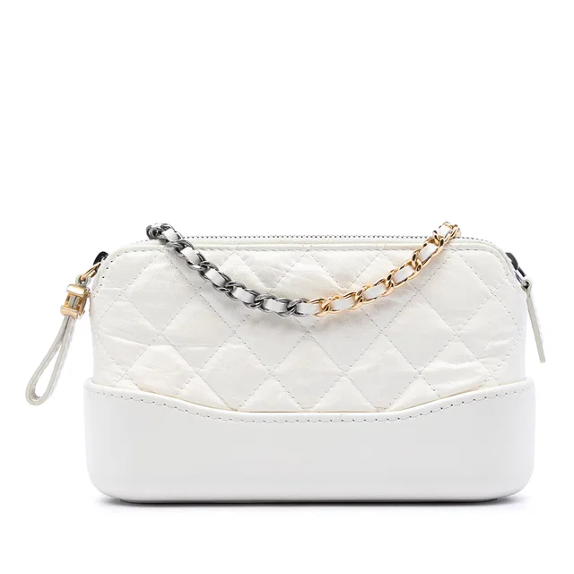 White Chanel Quilted Aged Calfskin Gabrielle Clutch With Chain Crossbody Bag in White Calfskin from Designer Revival, photo 1 of 1