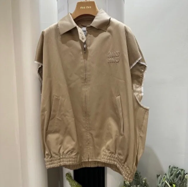 Miu Miu khaki distressed vest in Green from Luxury Promise