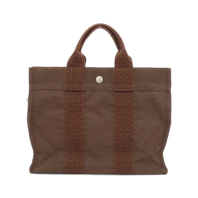 Hermès Herline PM Bag in Canvas from The Reluxe