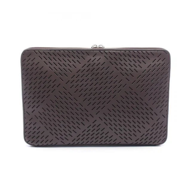 Bottega Veneta Clutch Perforated Dark Brown Black Leather in Black Leather from The Reluxe