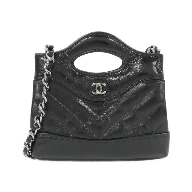 Chanel Chain Clutch Black in Black from The Reluxe