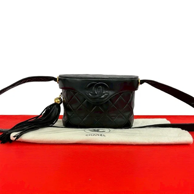 Chanel And Vintage CC Logo Lambskin Tassel Shoulder Bag Vanity Black in Black Lambskin from The Reluxe