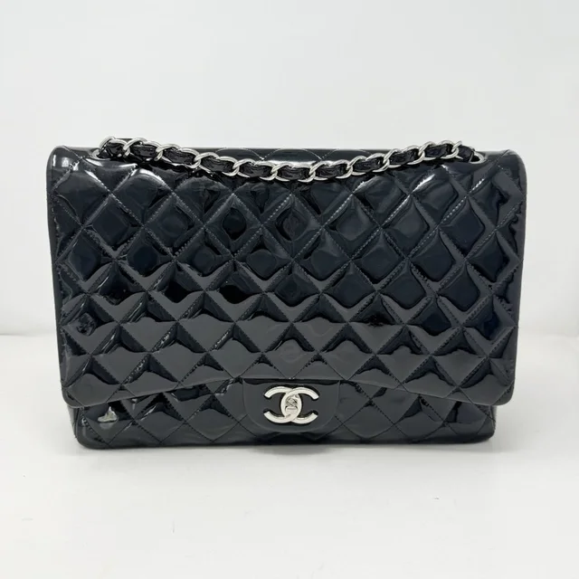 Chanel Patent Maxi Classic Double Flap Bag in black Patent leather from Poshmark, photo 1 of 1