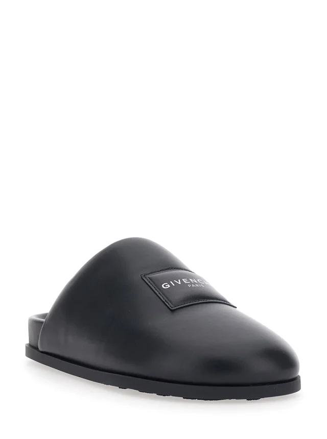 GIVENCHY Black Mules with Asymmetrical Design and Padded Leather Logo Women in Black 100% Lamb, photo 3 of 8 from Gaudenzi Boutique