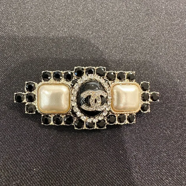 Chanel Gold Crystal Pearl Brooch in Gold from Luxury Promise